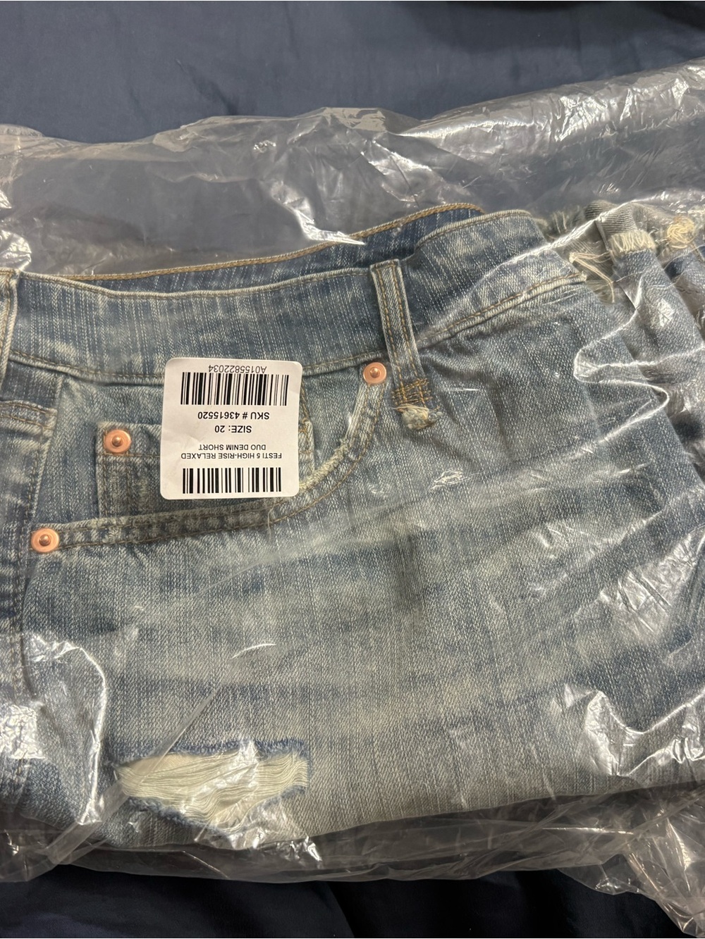 Torrid Light Wash Distressed Denim Jeans
